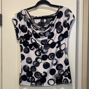 Stylish Black and White Draped Blouse with Circular Design